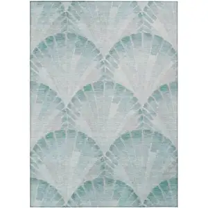 Photo of Teal Blue And Ivory Seashell Washable Indoor Outdoor Area Rug