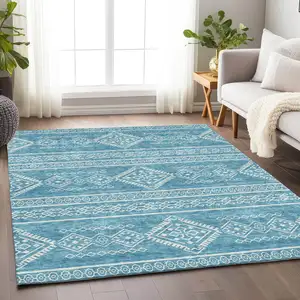 Photo of Teal Blue And Ivory Southwestern Washable Indoor Outdoor Area Rug