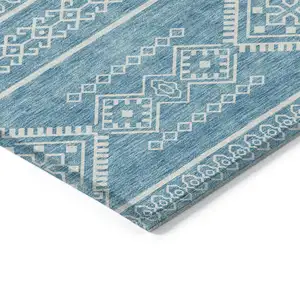 Photo of Teal Blue And Ivory Southwestern Washable Indoor Outdoor Area Rug