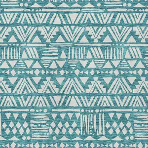 Photo of Teal Blue And Ivory Southwestern Washable Indoor Outdoor Area Rug