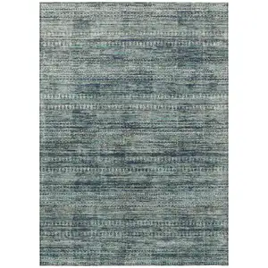 Photo of Teal Blue And Ivory Striped Washable Indoor Outdoor Area Rug