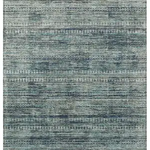 Photo of Teal Blue And Ivory Striped Washable Indoor Outdoor Area Rug