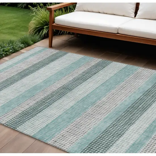 Teal Blue And Ivory Striped Washable Indoor Outdoor Area Rug Photo 2