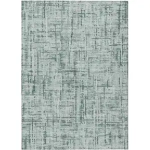 Photo of Teal Blue And Ivory Striped Washable Indoor Outdoor Area Rug