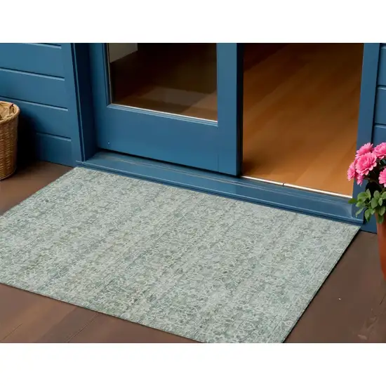 Teal Blue And Ivory Striped Washable Indoor Outdoor Area Rug Photo 2