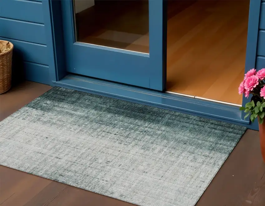 Teal Blue And Ivory Striped Washable Indoor Outdoor Area Rug Photo 1