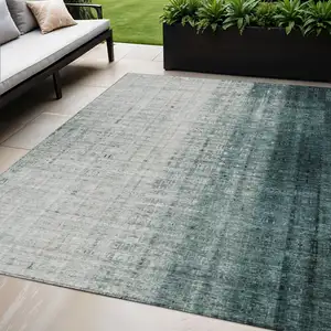 Photo of Teal Blue And Ivory Striped Washable Indoor Outdoor Area Rug