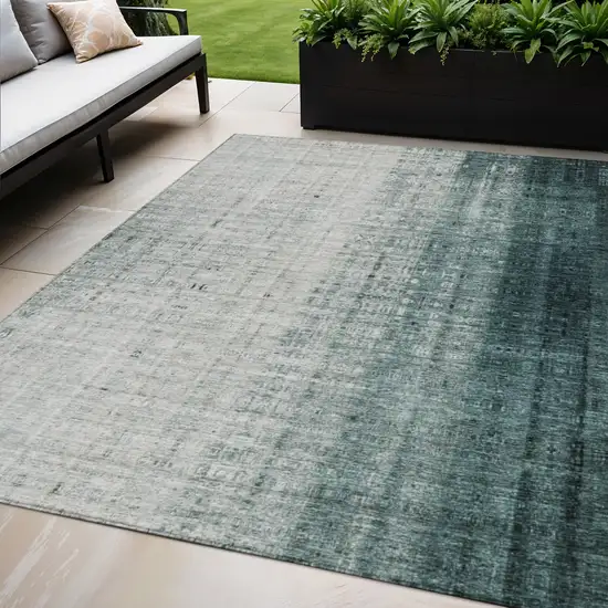 Teal Blue And Ivory Striped Washable Indoor Outdoor Area Rug Photo 1