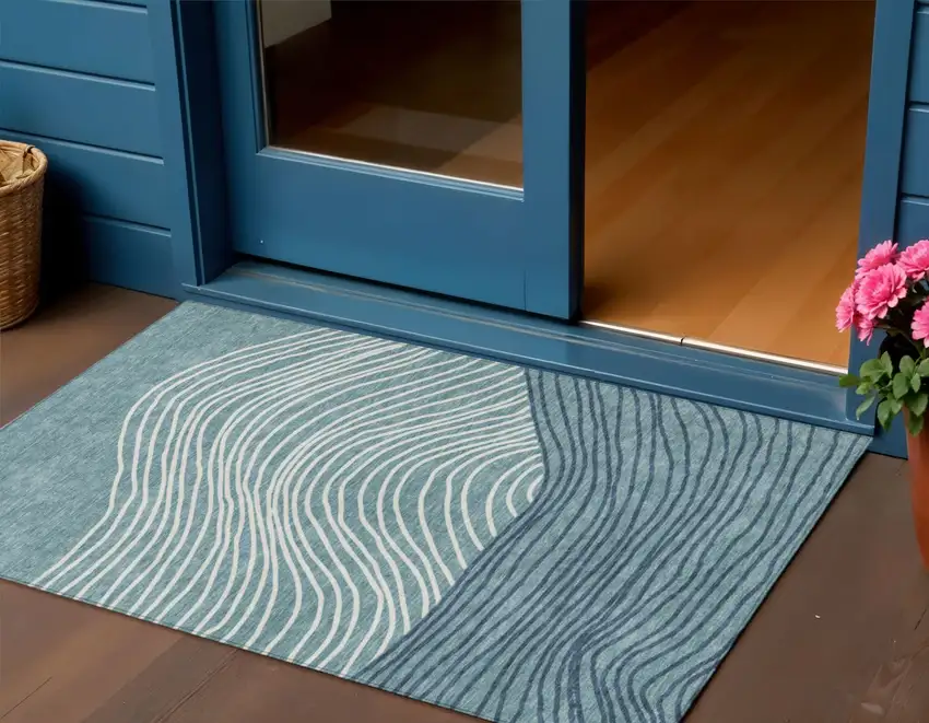 Teal Blue And Ivory Striped Washable Indoor Outdoor Area Rug Photo 1