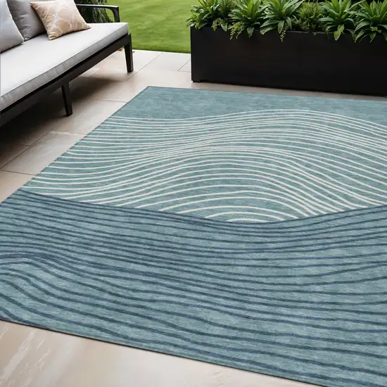 Teal Blue And Ivory Striped Washable Indoor Outdoor Area Rug Photo 1