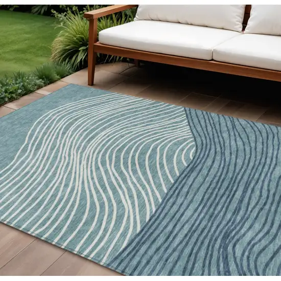 Teal Blue And Ivory Striped Washable Indoor Outdoor Area Rug Photo 1