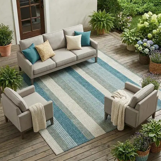 Teal Blue And Ivory Striped Washable Indoor Outdoor Area Rug Photo 1