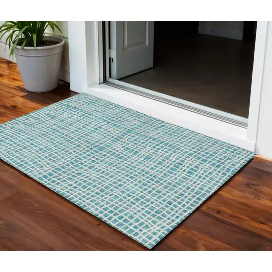 Teal Blue And Ivory Striped Washable Indoor Outdoor Area Rug Photo 1