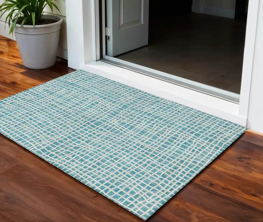 Teal Blue And Ivory Striped Washable Indoor Outdoor Area Rug Photo 1