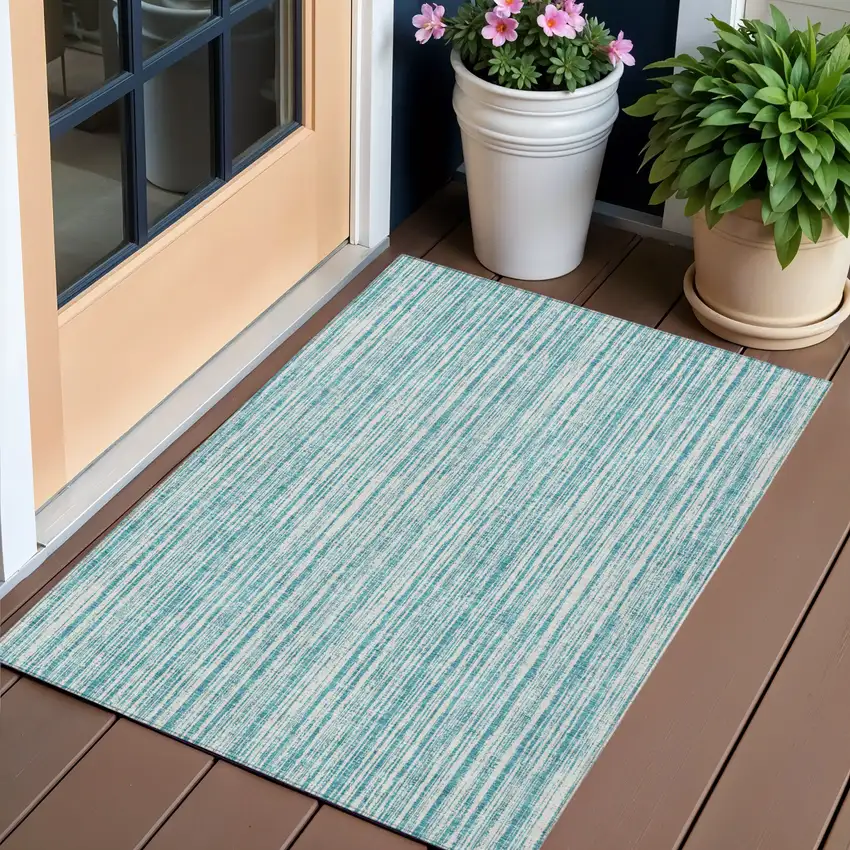 Teal Blue And Ivory Striped Washable Indoor Outdoor Area Rug Photo 1