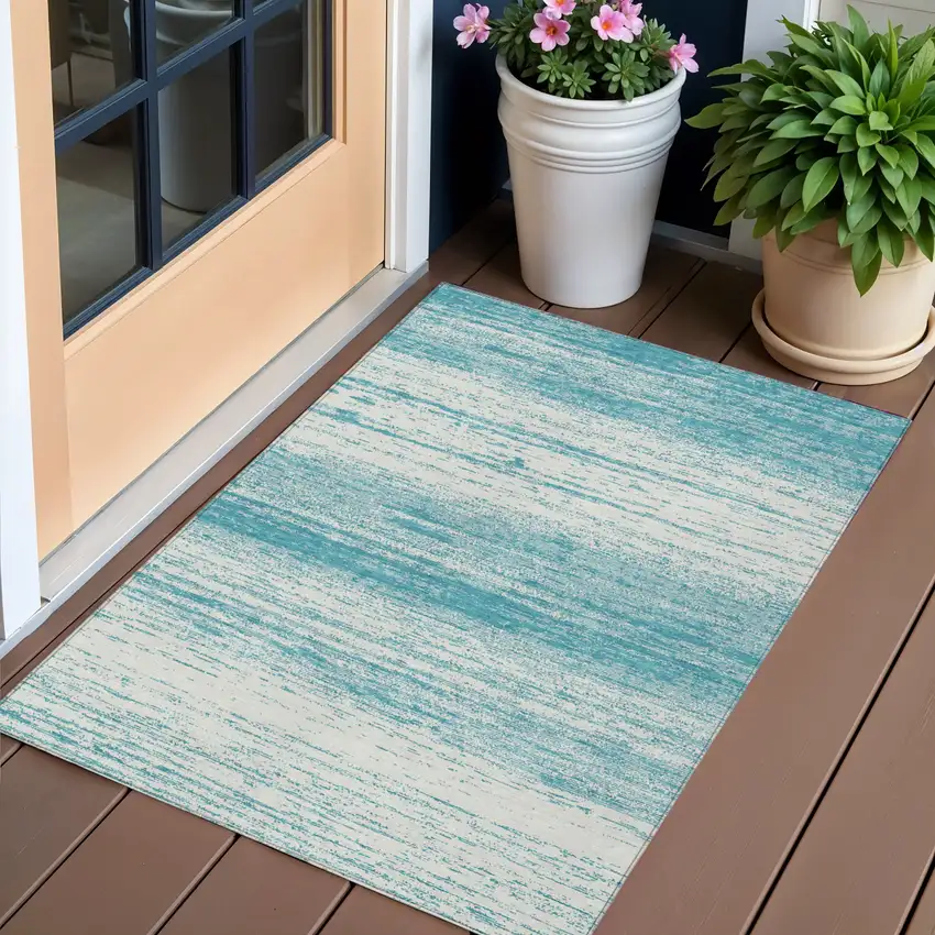 Teal Blue And Ivory Striped Washable Indoor Outdoor Area Rug Photo 1