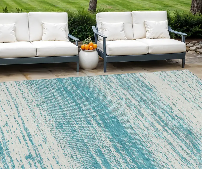Teal Blue And Ivory Striped Washable Indoor Outdoor Area Rug Photo 1