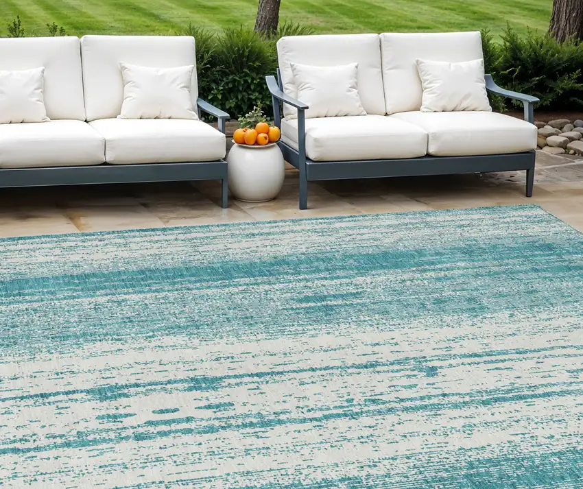 Teal Blue And Ivory Striped Washable Indoor Outdoor Area Rug Photo 1