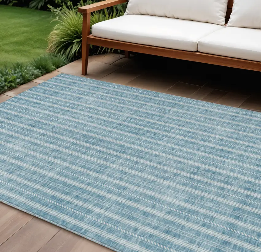 Teal Blue And Ivory Striped Washable Indoor Outdoor Area Rug Photo 1