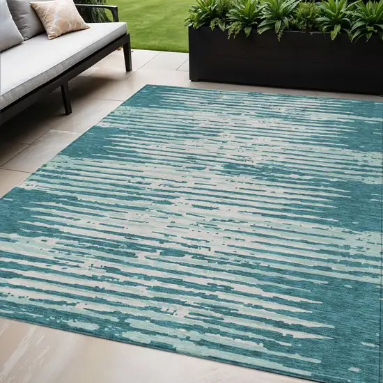 Teal Blue And Ivory Striped Washable Indoor Outdoor Area Rug Photo 1