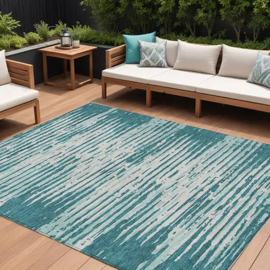 Teal Blue And Ivory Striped Washable Indoor Outdoor Area Rug Photo 1