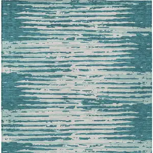 Photo of Teal Blue And Ivory Striped Washable Indoor Outdoor Area Rug