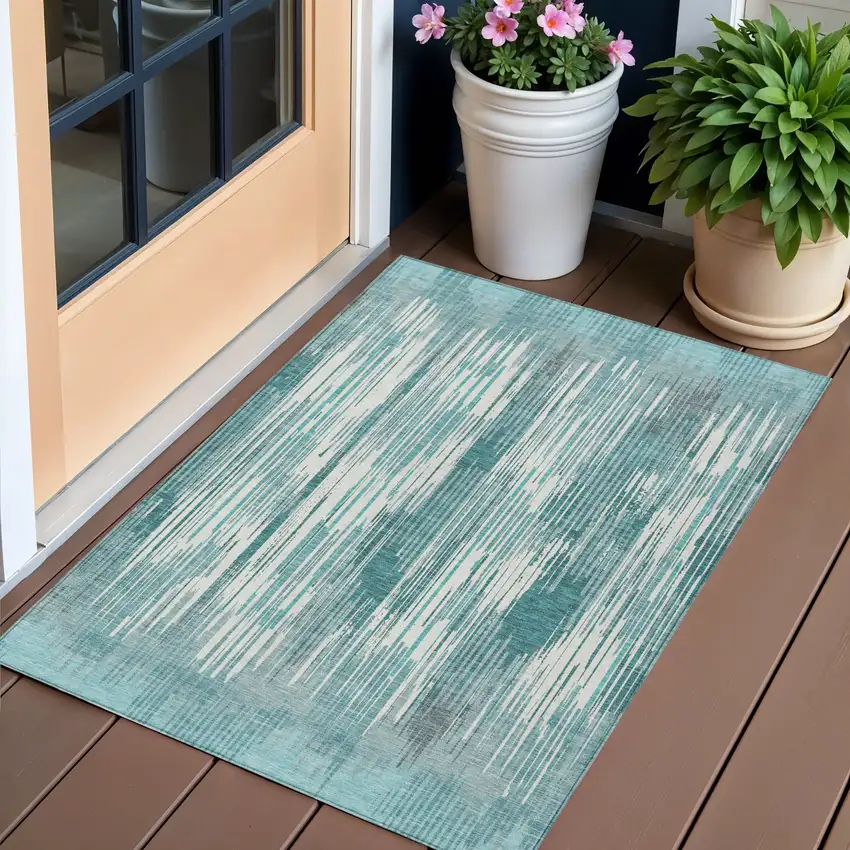 Teal Blue And Ivory Striped Washable Indoor Outdoor Area Rug Photo 1