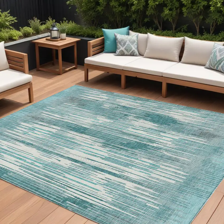 Teal Blue And Ivory Striped Washable Indoor Outdoor Area Rug Photo 1
