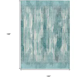 Photo of Teal Blue And Ivory Striped Washable Indoor Outdoor Area Rug