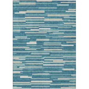 Photo of Teal Blue And Ivory Striped Washable Indoor Outdoor Area Rug