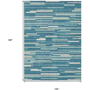 Photo of Teal Blue And Ivory Striped Washable Indoor Outdoor Area Rug