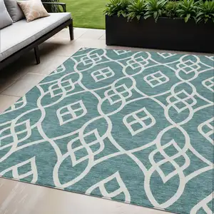 Photo of Teal Blue And Ivory Trellis Washable Indoor Outdoor Area Rug