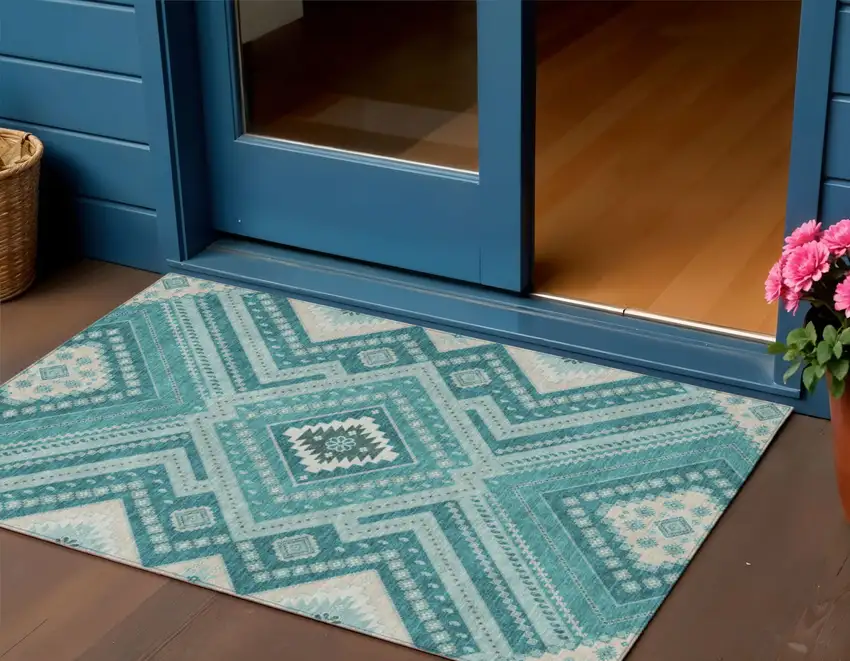Teal Blue And Ivory Tribal Washable Indoor Outdoor Area Rug Photo 1