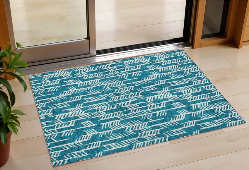 Teal Blue And Ivory Tribal Washable Indoor Outdoor Area Rug Photo 1
