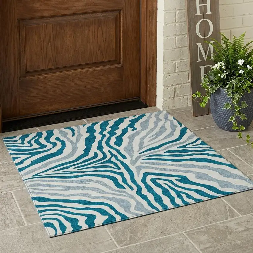 Teal Blue And Ivory Zebra Print Washable Indoor Outdoor Area Rug Photo 1
