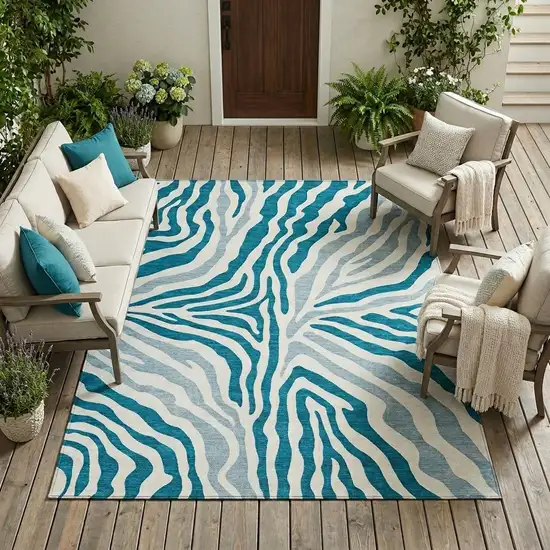 Teal Blue And Ivory Zebra Print Washable Indoor Outdoor Area Rug Photo 1