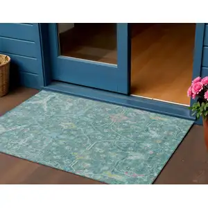 Photo of Teal Blue And Lime Green Floral Washable Indoor Outdoor Area Rug