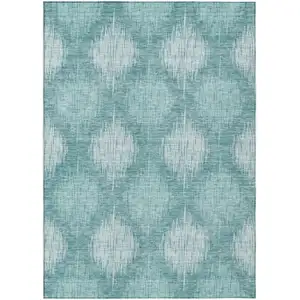 Photo of Teal Blue And Mint Green Ikat Washable Indoor Outdoor Area Rug