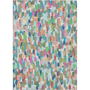 Photo of Teal Blue And Navy Blue Abstract Washable Indoor Outdoor Area Rug