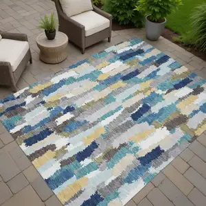Photo of Teal Blue And Navy Blue Striped Washable Indoor Outdoor Area Rug