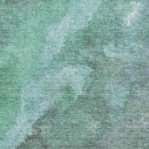 Photo of Teal Blue And Pale Aqua Abstract Washable Indoor Outdoor Area Rug