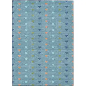 Photo of Teal Blue And Peach Geometric Washable Indoor Outdoor Area Rug