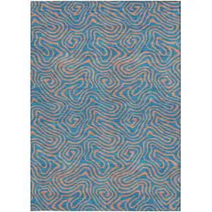 Photo of Teal Blue And Pink Abstract Washable Indoor Outdoor Area Rug