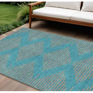 Photo of Teal Blue And Pink Geometric Washable Indoor Outdoor Area Rug