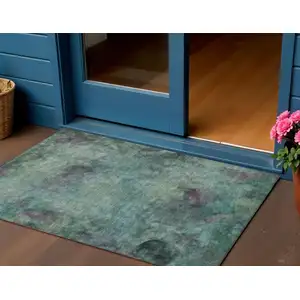 Photo of Teal Blue And Purple Abstract Washable Indoor Outdoor Area Rug