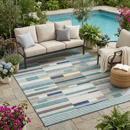 Teal Blue And Silver Striped Washable Indoor Outdoor Area Rug Photo 1