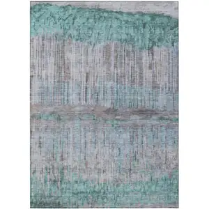 Photo of Teal Blue And Taupe Abstract Washable Indoor Outdoor Area Rug