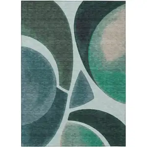 Photo of Teal Blue And Turquoise Abstract Washable Indoor Outdoor Area Rug