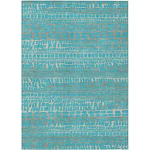 Photo of Teal Blue And Turquoise Abstract Washable Indoor Outdoor Area Rug