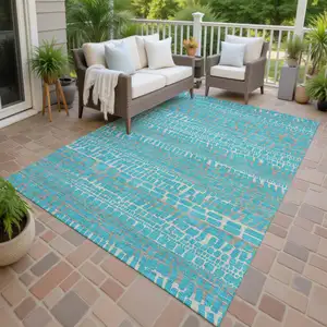 Photo of Teal Blue And Turquoise Abstract Washable Indoor Outdoor Area Rug